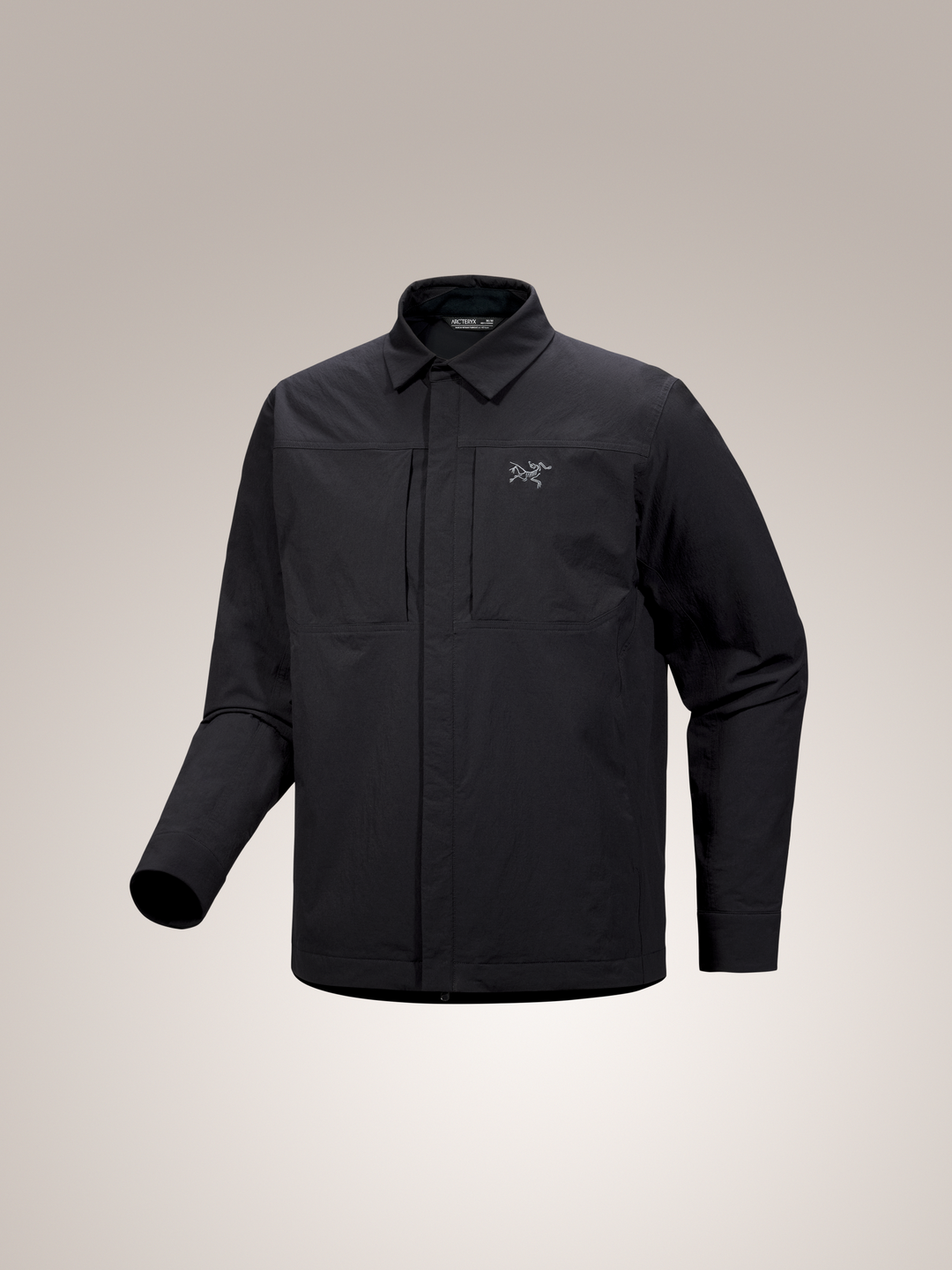 Black Arc'teryx Cronin insulated men's overshirt with a brand logo on a light gray background