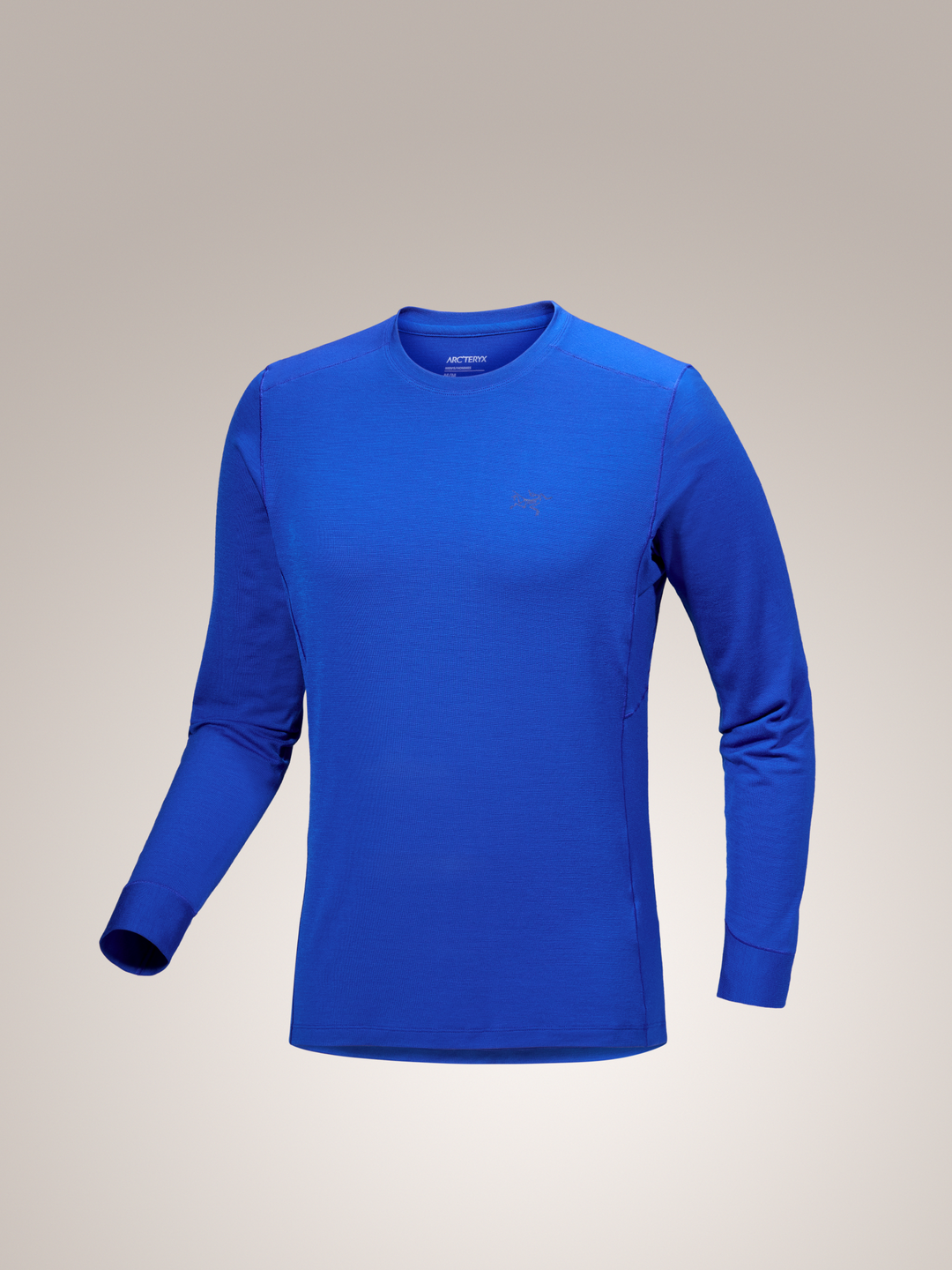 Vitality bue Arc'teryx Rho merino wool crew long-sleeve shirt on a light gray background