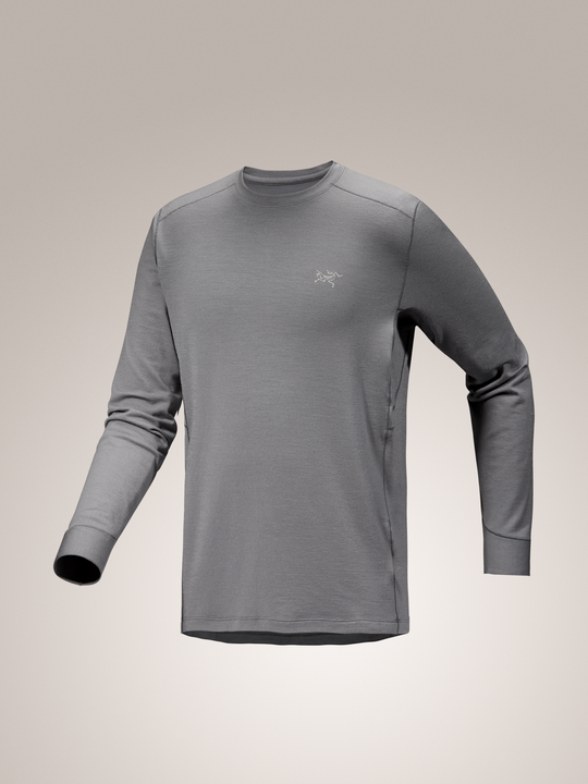 Void gray Arc'teryx Rho merino wool crew long-sleeve shirt with a brand logo on a light gray background