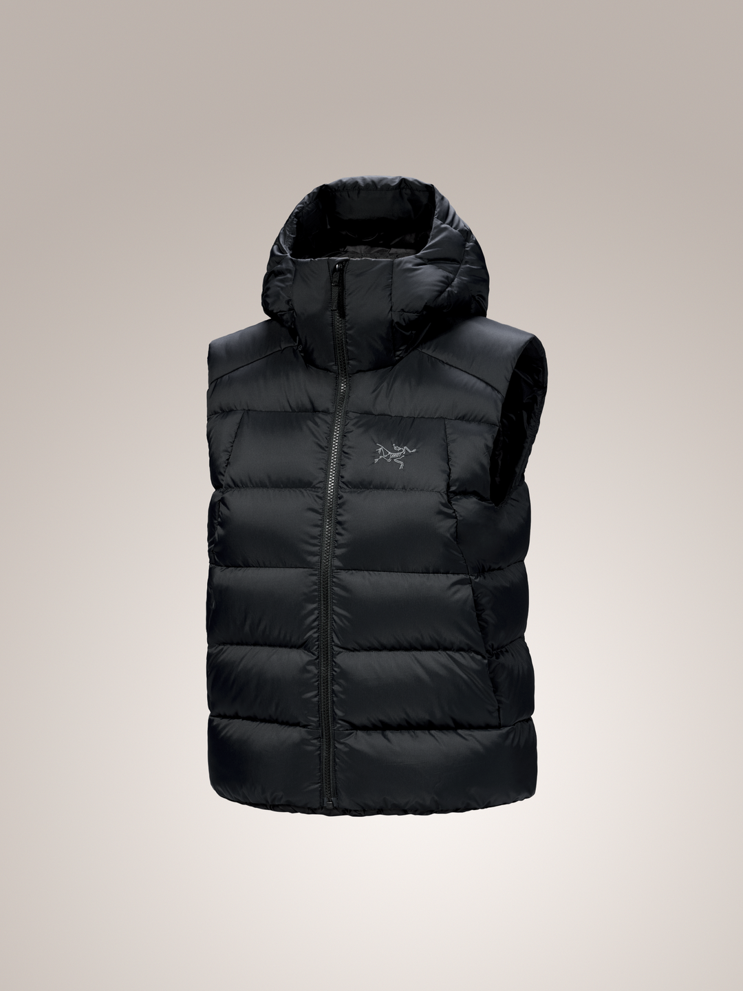 Black Arc'teryx Thorium women's hooded puffer vest with a brand logo on a light gray background