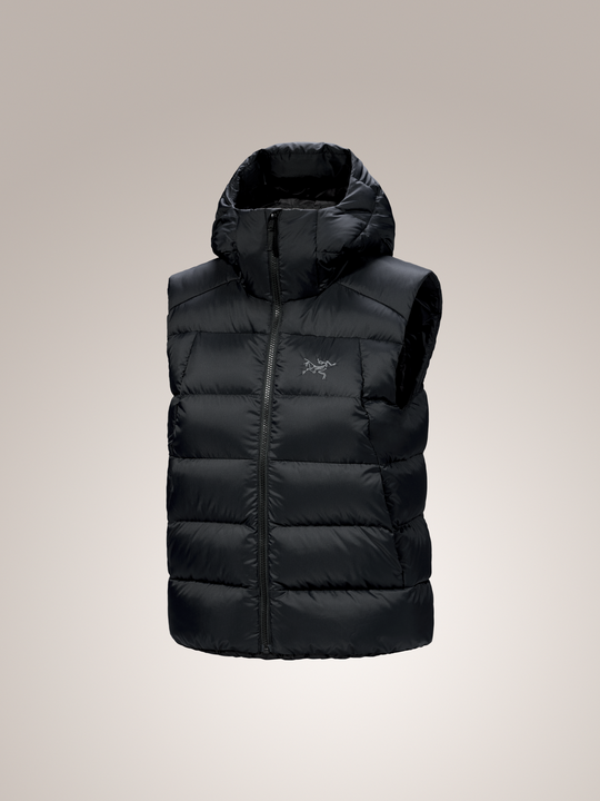 Black Arc'teryx Thorium women's hooded puffer vest with a brand logo on a light gray background
