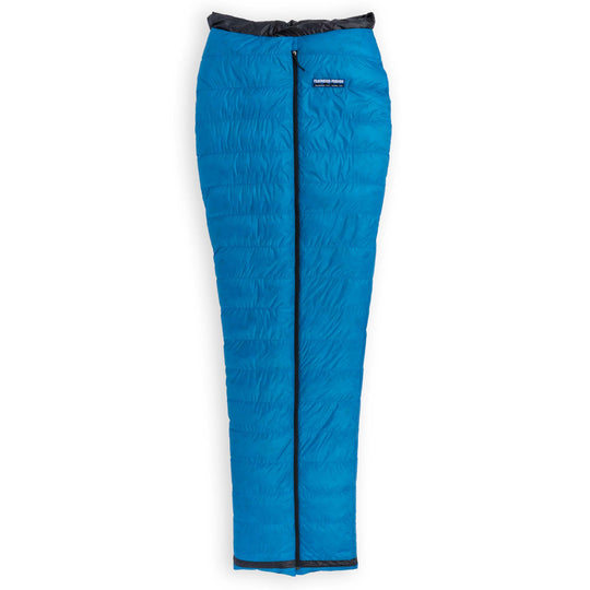 Fully zipped Feathered Friends Flicker UL Ultralight Down Quilt Sleeping Bag in Cerulean Blue on a white background