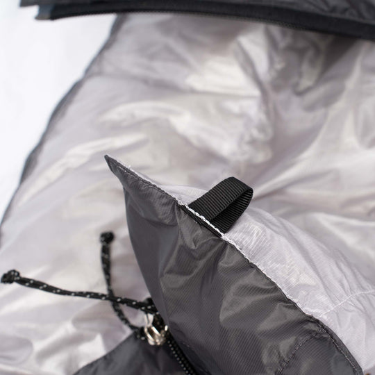 Close up detail of webbing loops on Feathered Friends Flicker UL down quilt sleeping bag