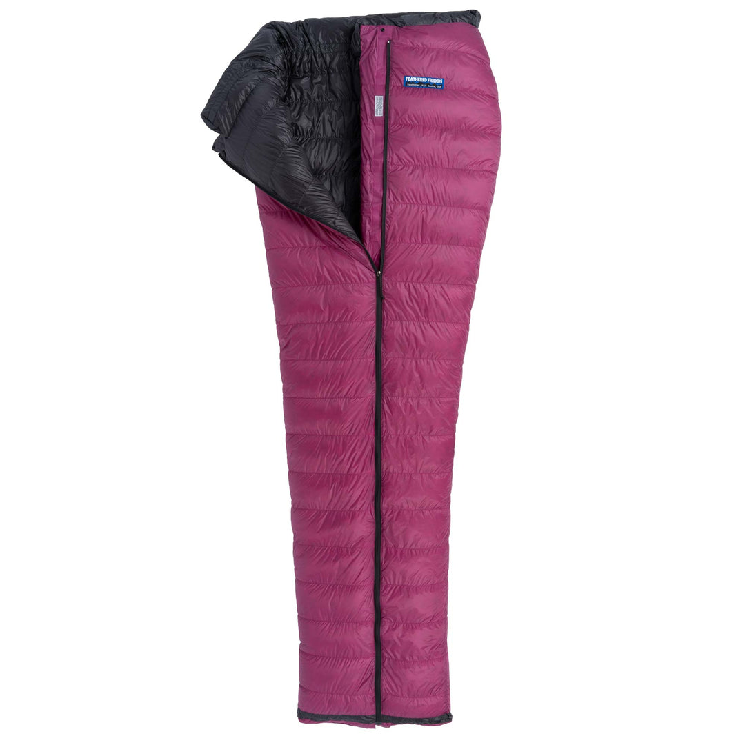 Partially unzipped Feathered Friends Flicker UL Ultralight Down Quilt Sleeping Bag in Magenta purple on a white background