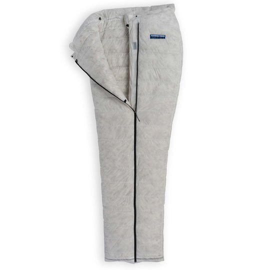 Partially unzipped Feathered Friends UL ultralight down quilt sleeping bag in Undyed Pertex Quantum Pro on a white background