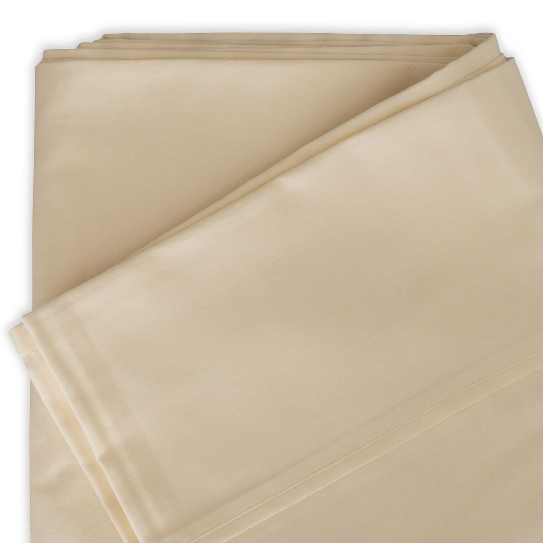 Studio detail photo of Ivory-color Feathered Friends Organic Cotton Flat Sheet