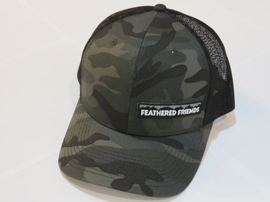 Studio image Feathered Friends Pro Style Offset Logo Trucker Hat black camo and black colors