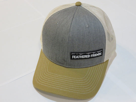 Studio image Feathered Friends Pro Style Offset Logo Trucker Hat heather grey and amber brown colors