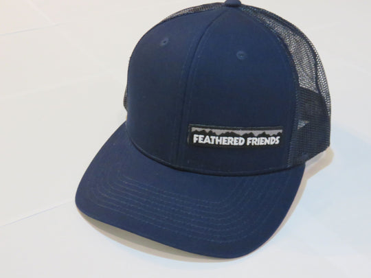 Studio image Feathered Friends Pro Style Offset Logo Trucker Hat navy and navy colors
