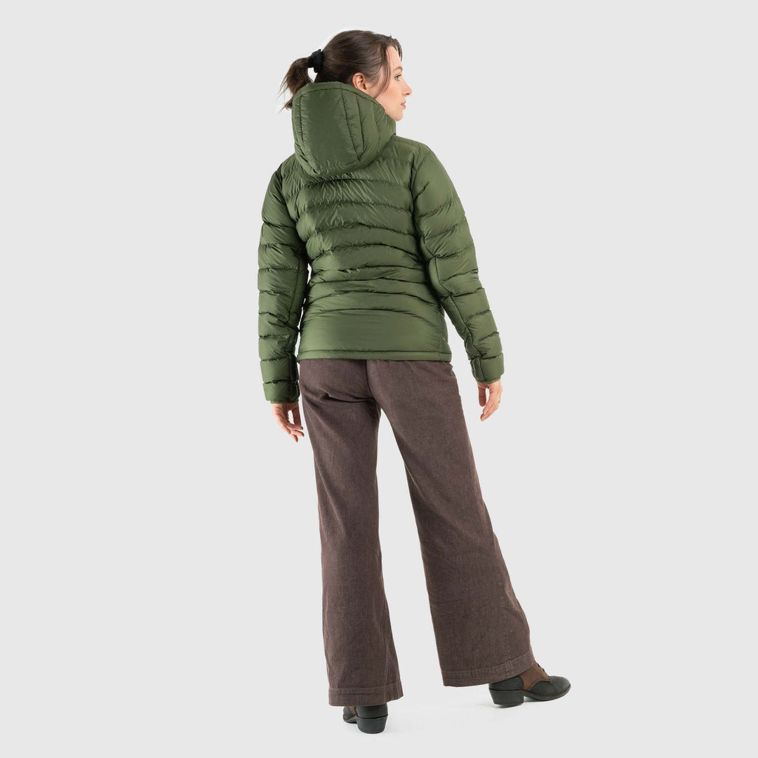 Studio back view of woman wearing a chive green Women's Feathered Friends Eos Down Jacket