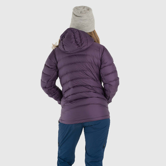Studio back view of woman wearing a dusky purple Women's Feathered Friends Eos Down Jacket
