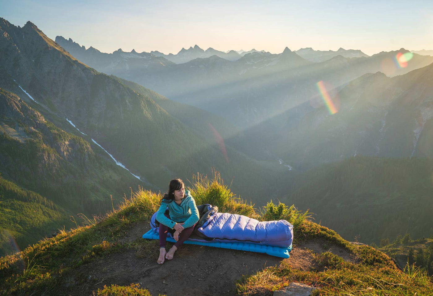 Feathered Friends Down Sleeping Bags. Over 40 models of down sleeping bags from 40ºF (4ºC) to -60ºF (-51ºC). This is the Feathered Friends Egret Down Sleeping Bag at a high camp in the summer in the North Cascades of Washington State