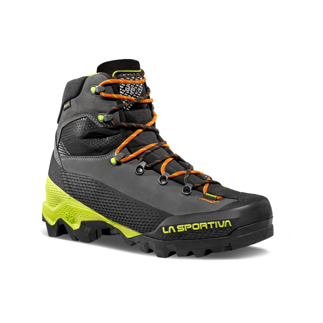 Side view of La Sportiva Aequilibrium LT GTX boot with orange laces on a white background