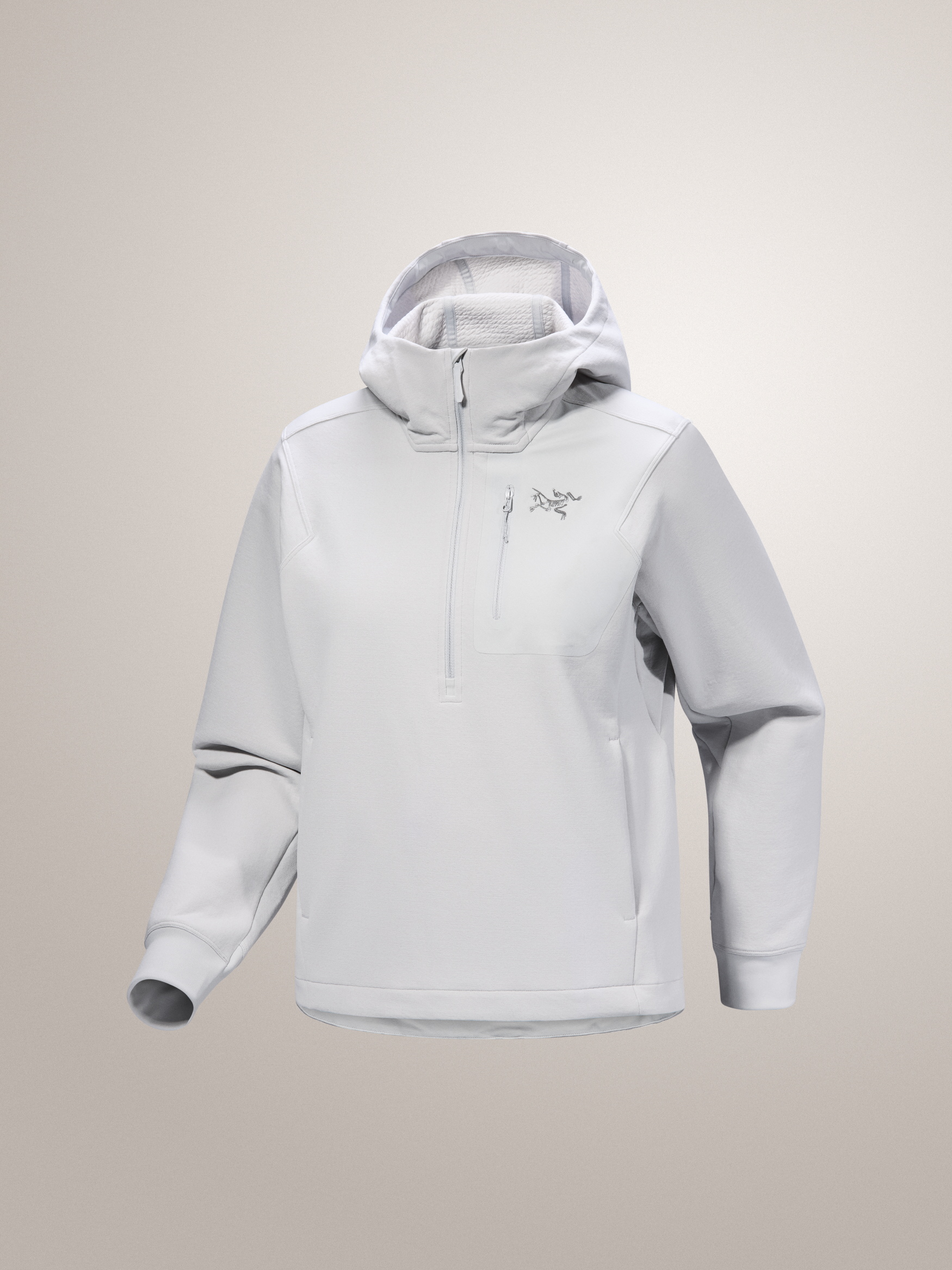 Light gray Solitude Arc'teryx Aestas hoodie with a brand logo on a beige background