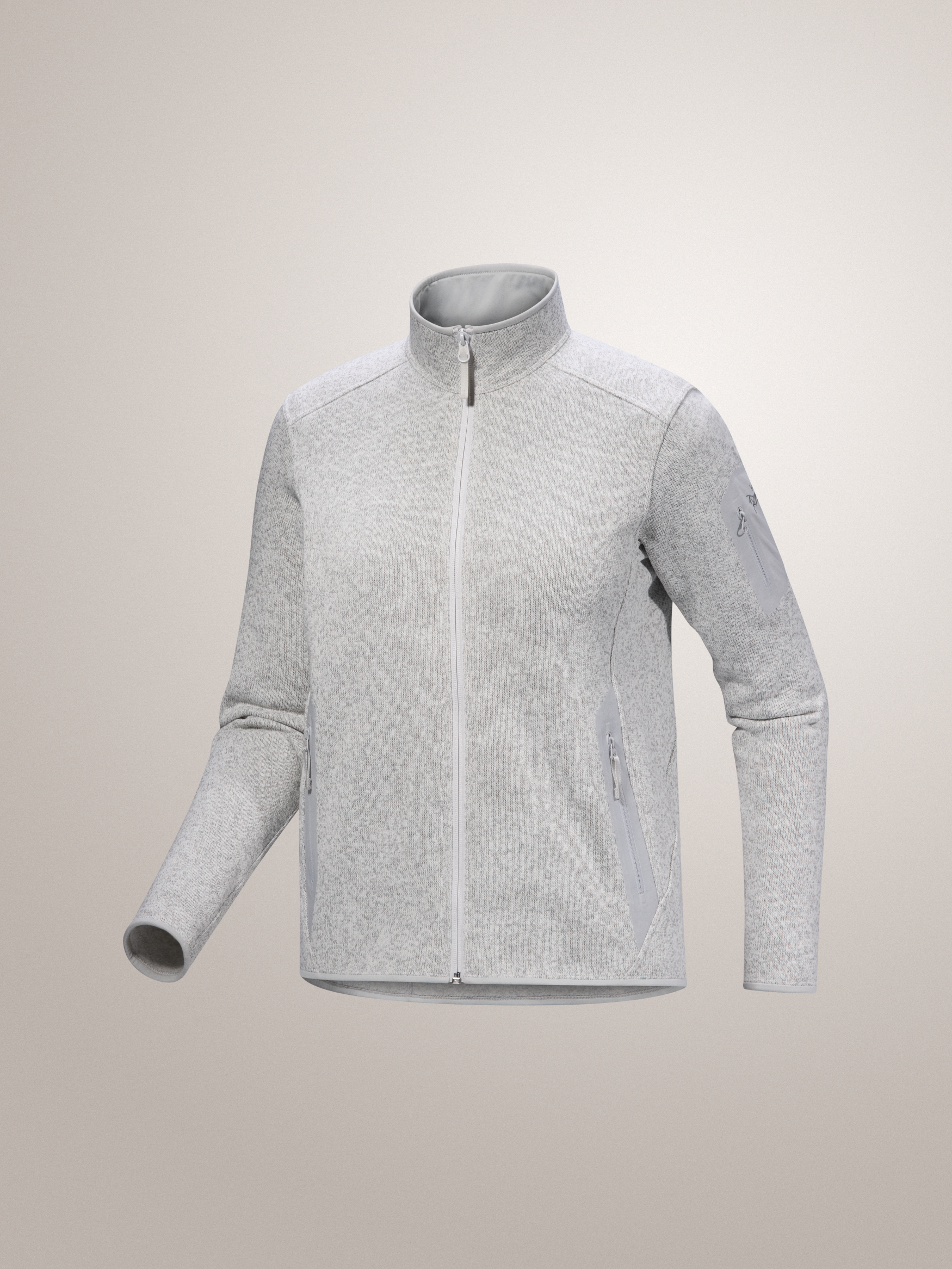 Atmos Heather gray Arc'teryx Covert Cardigan women's fleece jacket on a light gray background