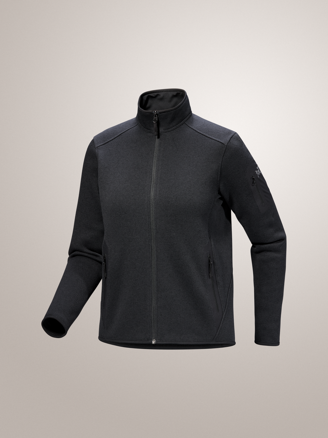 Black Arc'teryx Covert Cardigan women's baselayer on gray background