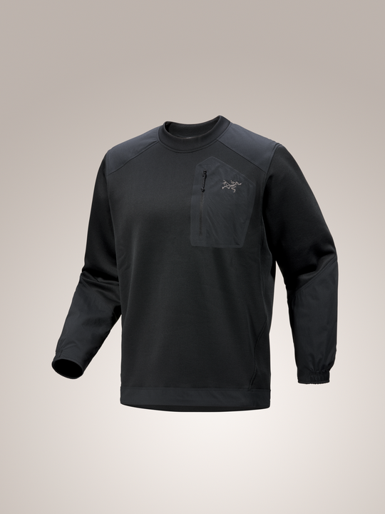 Black Arc'teryx Konseal crew neck pullover long-sleeve shirt with a logo on a light gray background