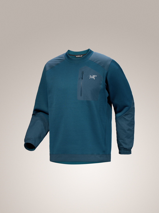 Nightscape Night blue Arc'teryx Konseal crew neck long-sleeve pullover shirt with a brand logo on a gray background