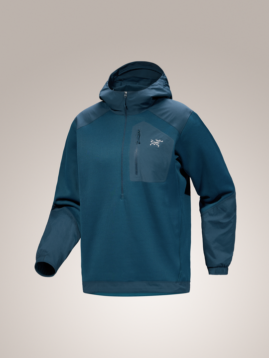 Nightscape blue Arc'teryx Konseal hooded pullover jacket on a light gray background
