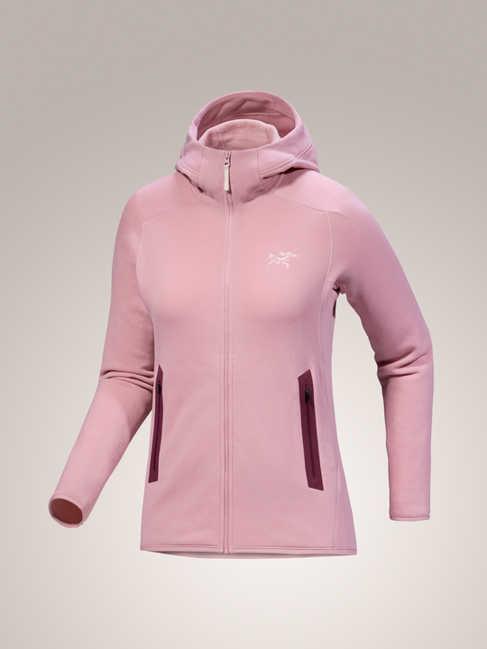 Bliss pink Arc'teryx Kyanite hoodie with a brand logo on a light gray background