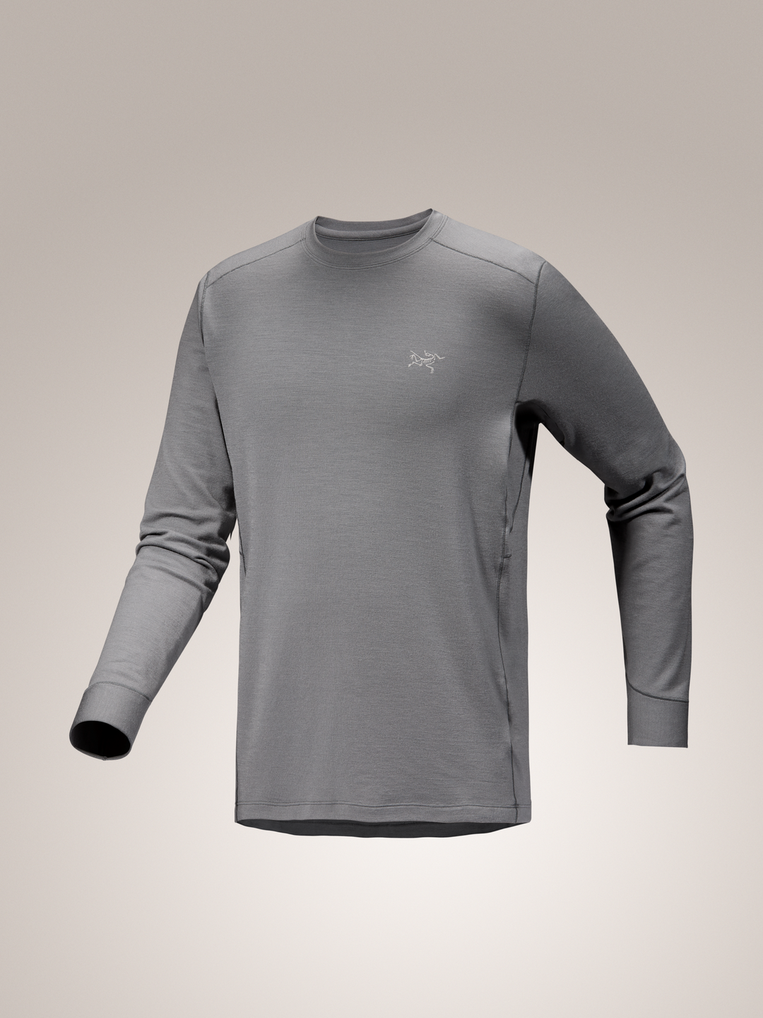 Void gray Arc'teryx Rho merino wool crew long-sleeve shirt with a brand logo on a light gray background