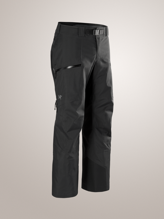Black Arc'teryx Sabre ski snowboard pants on a light gray background