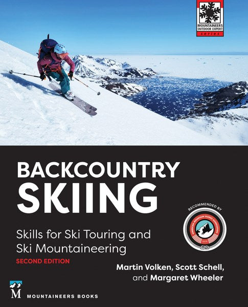 Book cover of 'Backcountry Skiing' with a skier on a mountain and water in the background.