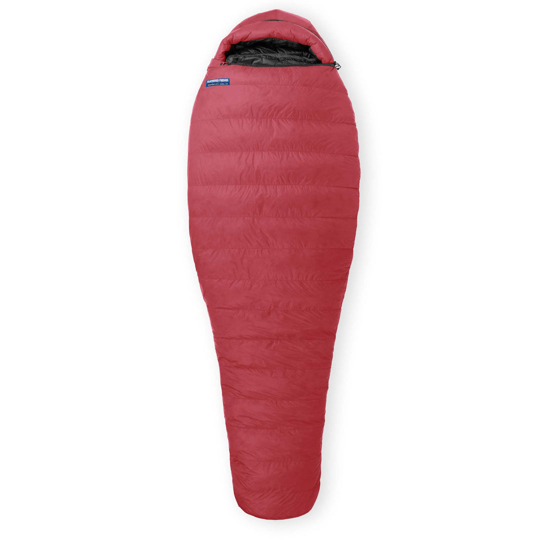 A Phoenix red Feathered Friends Women's Arctic Finch -10F Winter Light down sleeping bag on a white background