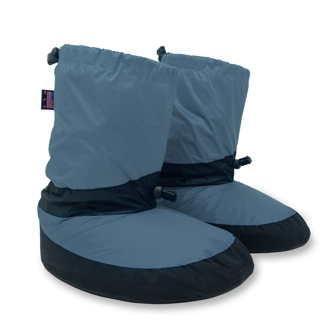 Feathered Friends down camp booties in slate blue on white background