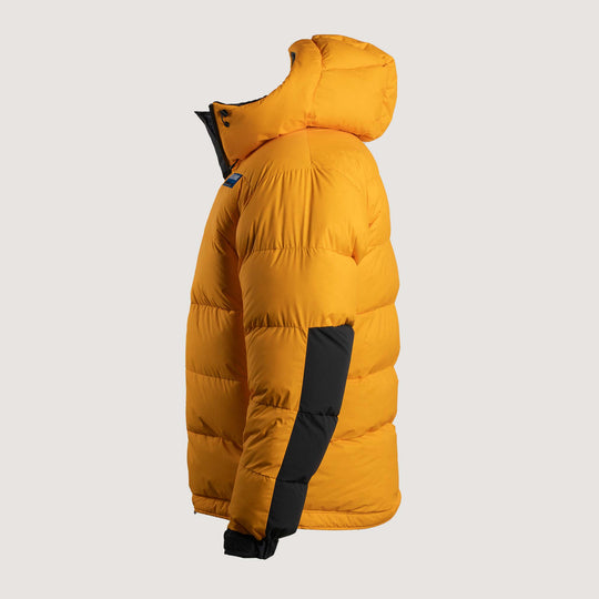 Feathered Friends Khumbu Parka Saffron Yellow studio photo view of the side