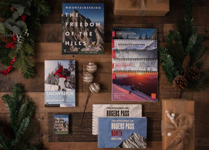 Climbing, backcountry skiing, snowshoe, and hiking guidebooks with holiday decorations