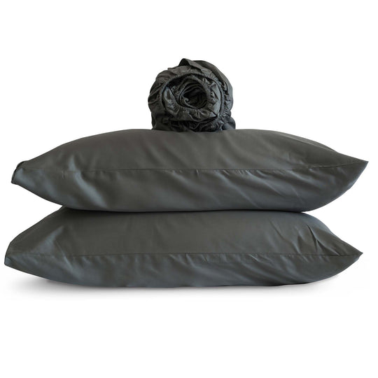 Studio photo of Cascade-color Feathered Friends Organic Cotton rolled Fitted Sheet and two pillow cases