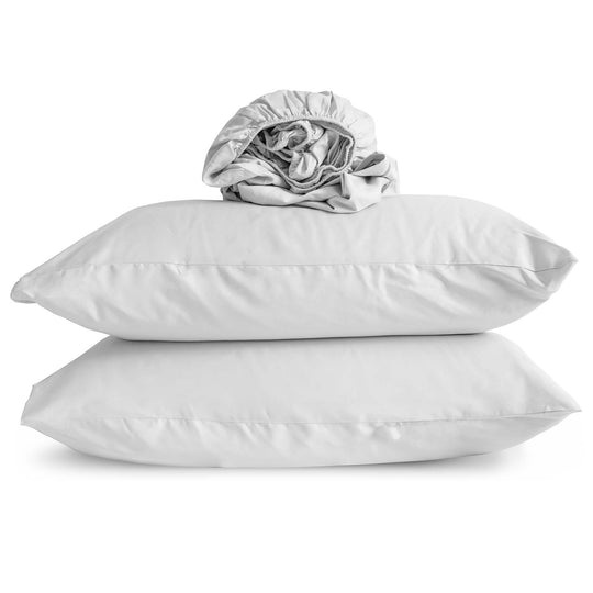 Studio photo of White-color Feathered Friends Organic Cotton Fitted Sheet rolled up on two pillow cases