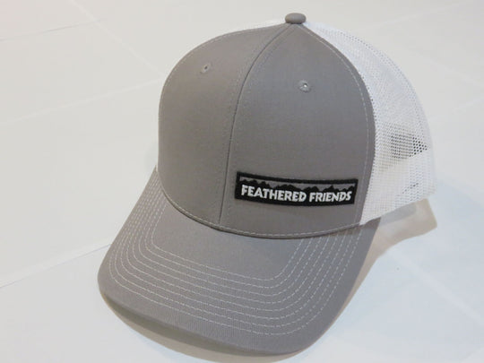 Studio image Feathered Friends Pro Style Offset Logo Trucker Hat grey and white colors