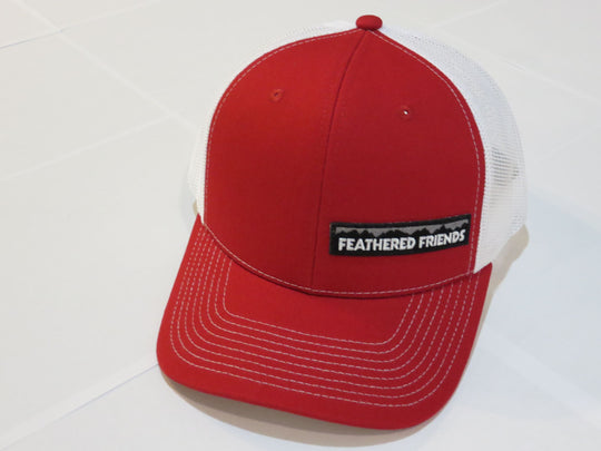 Studio image Feathered Friends Pro Style Offset Logo Trucker Hat red and white colors