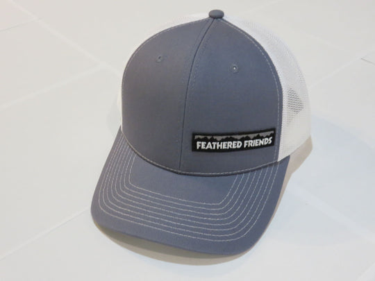 Studio image Feathered Friends Pro Style Offset Logo Trucker Hat steel blue and white colors