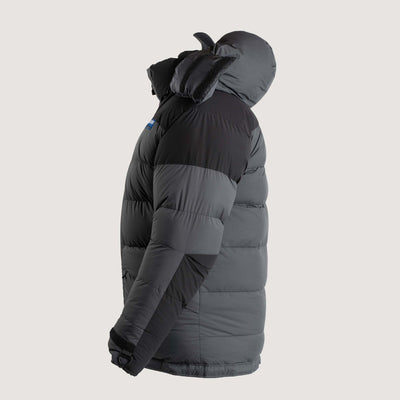 Studio image of the Feathered Friends Rock & Ice Expedition Down Parka Iron Gray color viewed from the side