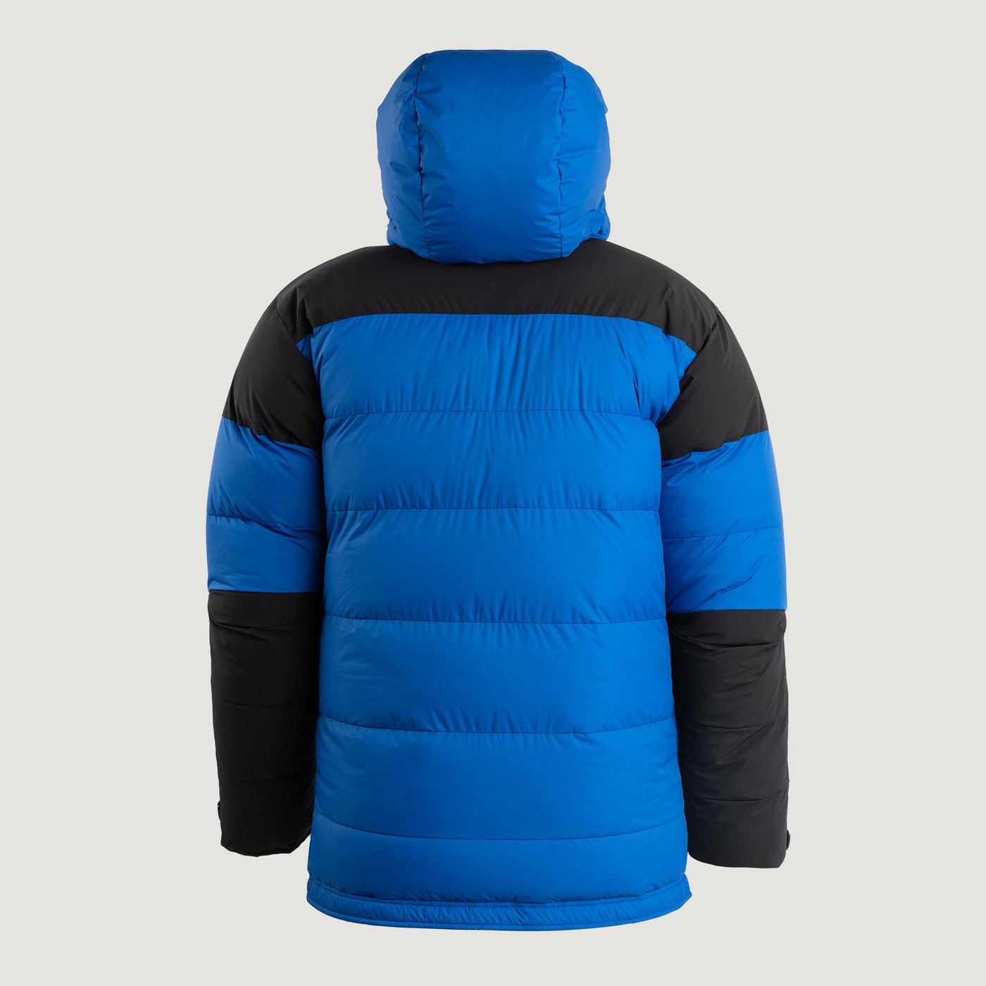 Studio image of the Feathered Friends Rock & Ice Expedition Down Parka Royal Blue color viewed from the back