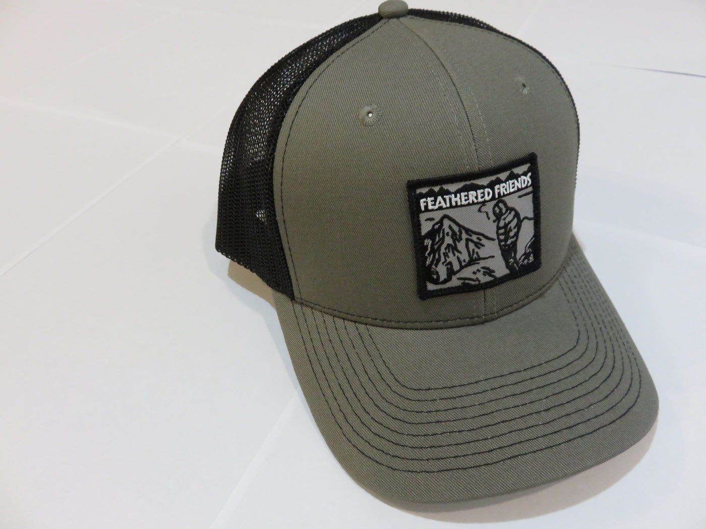 Feathered Friends Smoking Man Pro Style Trucker Hat