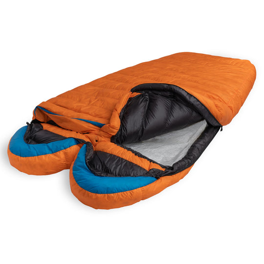 Flame orange Spoonbill UL 2-Person down sleeping bag with blue hood trim partially unzipped on a white background
