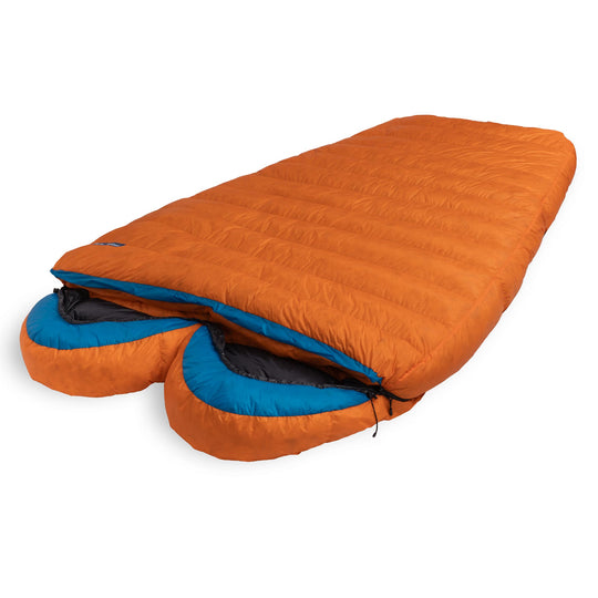 Flame orange Spoonbill UL 2-Person down sleeping bag with blue hood trim on a white background