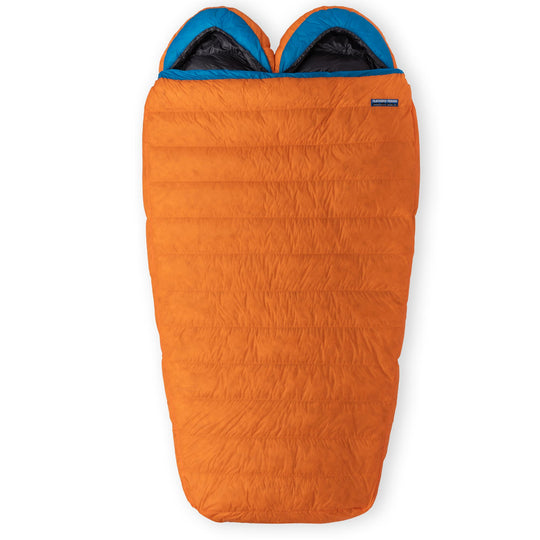 Flame orange Spoonbill UL 2-Person down sleeping bag with blue hood trim on a white background