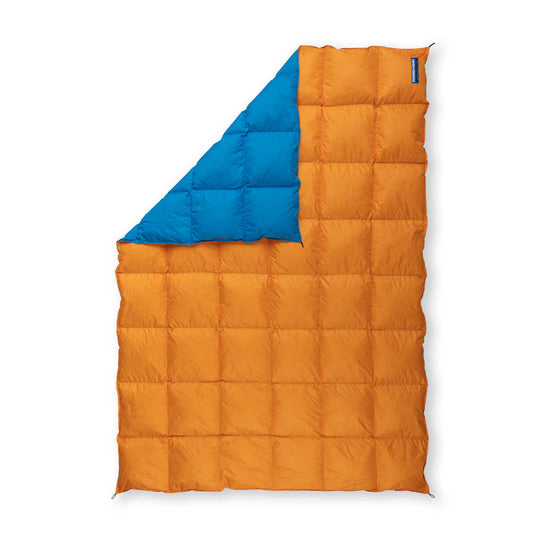 Other side of Feathered Friends blue and orange ultralight down blanket on white background