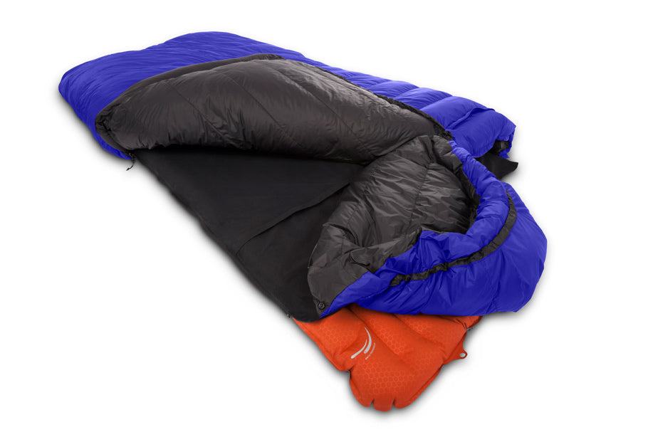 Studio image of Feathered Friends Penguin Sleeping Bag with Groundsheet and orange sleeping pad